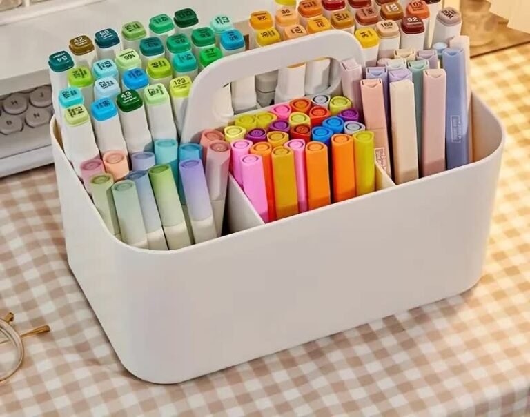 White 5-compartment desk organizer caddy with a carry handle, filled with colored markers